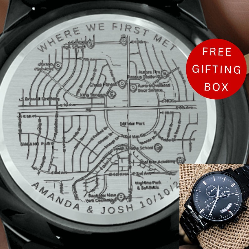 May include: Black wristwatch with a detailed map engraved on the watch face, featuring the text "WHERE WE FIRST MET." The watch also includes the names "AMANDA & JOSH" and the date "10/10/12." A red circle with "FREE GIFTING BOX" is visible.