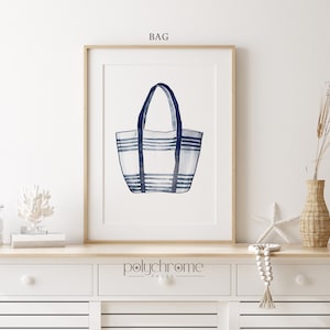 May include: A watercolor illustration of a blue and white striped tote bag. The bag is hanging from its handles and has a white background with blue stripes. The image is framed and has the text "BAG" at the top and "polychrome pages" at the bottom.