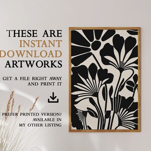 May include: Black and white abstract floral print art with a brown wood frame. The text "THESE ARE INSTANT DOWNLOAD ARTWORKS GET A FILE RIGHT AWAY AND PRINT IT PREFER PRINTED VERSION? AVAILABLE IN MY OTHER LISTING" is below the image.