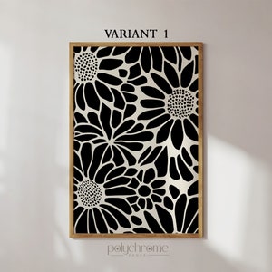 May include: Black and white floral print art print in a wooden frame. The print features a repeating pattern of stylized flowers.