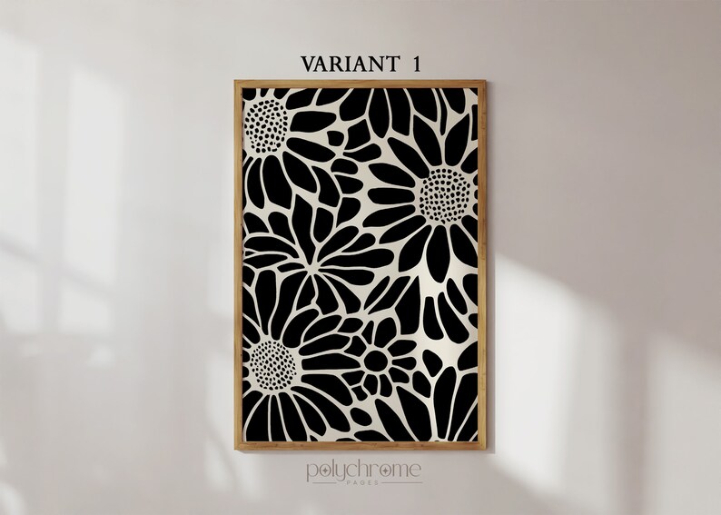 May include: Black and white floral print art print in a wooden frame. The print features a repeating pattern of stylized flowers.