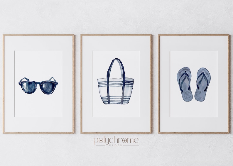 May include: Three framed watercolor illustrations of summer essentials: a pair of sunglasses, a striped tote bag, and a pair of flip flops. All items are in shades of blue.