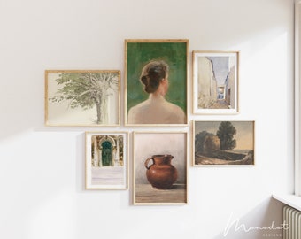 May include: A gallery wall with six framed art prints. The prints feature a variety of subjects, including a woman's back, a tree, a doorway, a street scene, a landscape, and a still life with a brown jug. The prints are all in different sizes and styles, but they are all framed in a simple, natural wood frame.