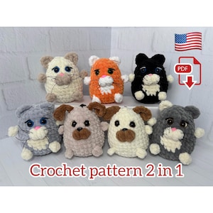 May include: A selection of crocheted toy animals in shades of white, orange, black, grey, and beige. The toys are designed as cats and dogs, with embroidered details and yarn whiskers. The image includes the text "Crochet pattern 2 in 1".