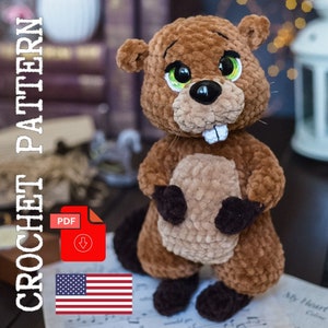 Modello di castoro all'uncinetto. Castoro di peluche carino fai da te. Modello di giocattolo all'uncinetto