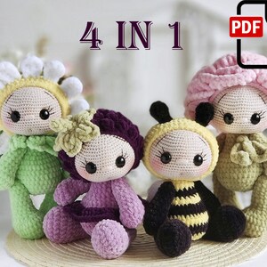 May include: Four crochet amigurumi dolls in different designs: a daisy, a bee, a grape, and a flower. The dolls are all sitting on a woven mat. The image includes the text "4 IN 1" and a PDF download icon.