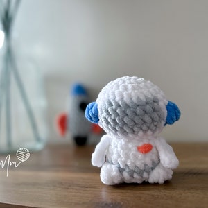 Patron de poche astronaute sans couture au crochet