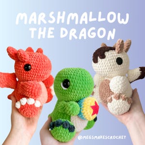 May include: Three crocheted stuffed animals: a red dragon, a green dinosaur holding a colorful ball, and a brown and white cow. The caption reads "Marshmallow the Dragon" and "@megsmakescrochet".