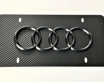 Placa de matrícula delantera de acero inoxidable cromado con espejo de 4 anillos 3D con tapas