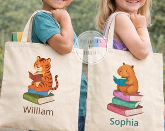Bolsa de livros infantil personalizada, bolsa de lona com nome personalizado, estampa de animais lendo, presente ideal para crianças em idade pré-escolar e amantes de livros.
