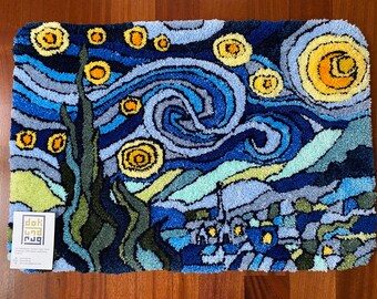 May include: A rectangular rug featuring a vibrant depiction of Van Gogh's "Starry Night." The design showcases swirling blues, yellows, and greens, with prominent stars and a stylized village. The rug is made of textured material.