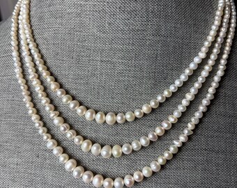 Freshwater pearl layered necklace. 3-8mm gradual pearl beads with gold/silver plated buckle. 1-4 layers