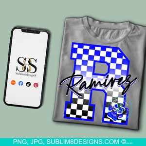 May include: A gray t-shirt with a blue and white checkered letter "R" and the name "Ramirez" in a black cursive font.