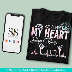 May include: Black t-shirt with a floral design and the text "When she competes my heart skips beats". The design includes a stylized heart and two figures in a gymnastics pose.