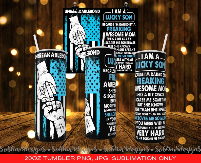 May include: A collection of black tumblers and a poster with the text "UNBREAKABLEBOND" and "I AM A LUCKY SON". The tumblers and poster feature a design with a blue and white American flag and a graphic of two hands. The text on the tumblers and poster is in white.