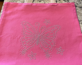 Medium pink tote with a butterfly rhinestone on it