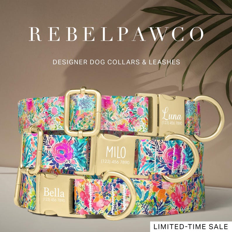 May include: Three floral-patterned dog collars with gold-colored hardware. Each collar has a different dog's name engraved on the buckle: Bella, Milo, and Luna, along with a phone number. The collars are in a stack, with the text "REBELPAWCO" and "DESIGNER DOG COLLARS & LEASHES" at the top.