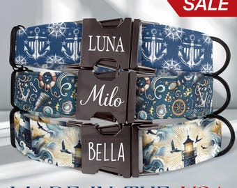 May include: Three personalized dog collars with nautical designs. The top collar is navy blue with white anchors and compass roses, the middle one has nautical elements, and the bottom one features a lighthouse. Each collar has a black buckle with a pet's name.