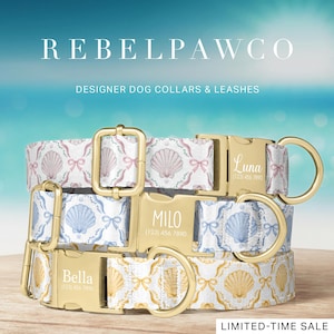May include: Three designer dog collars with gold-colored hardware. The collars feature a seashell and bow pattern in pink, blue, and yellow on a white background. Each collar is personalized with a dog's name and phone number. The brand name "REBELPAWCO" is at the top.