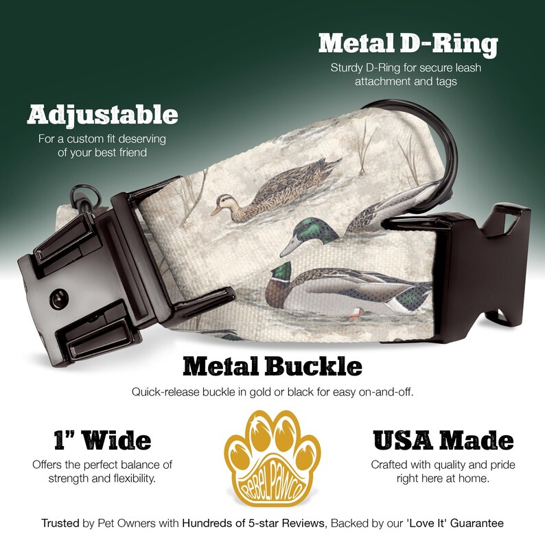 May include: A 1-inch wide adjustable dog collar with a white background featuring a duck hunting scene. The collar has a black metal buckle and a metal D-ring. The collar is made in the USA and is backed by a 'Love It' Guarantee.