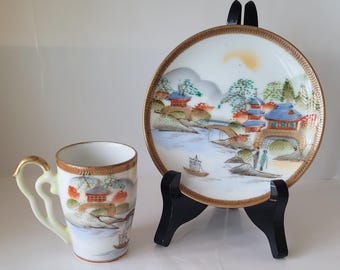 Vintage porselein Japans theekopje met schotel van Satsuma Kutani