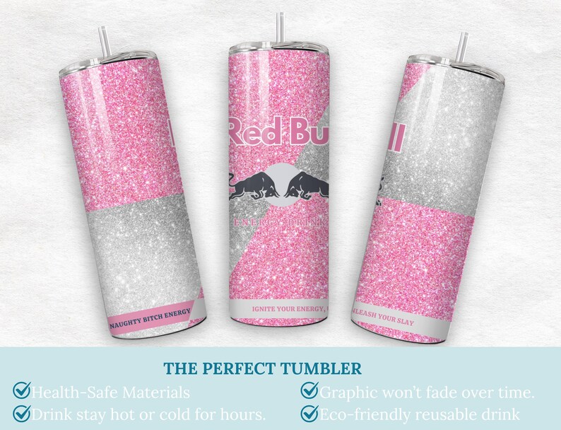 May include: Three glitter-covered tumblers with a pink and silver design. The Red Bull logo is visible on one tumbler. Text on the tumblers includes "Naughty Bitch Energy", "Ignite Your Energy", and "Leash Your Slay". The tumblers have a straw and a lid.
