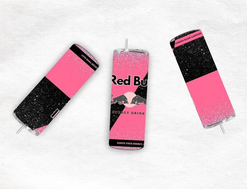 May include: Three glitter-covered tumblers with a pink and black design. One tumbler features the Red Bull logo and text, while the others have text that reads "LEASH YOUR SLAY" and "NAUGHTY BITCH ENERGY".