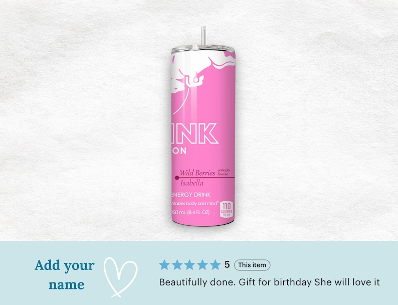 May include: A pink and white tumbler with a straw. The tumbler has the word "INK" in large white letters, and the words "Wild Berries Isabella" are printed below. The tumbler is designed to hold 50 ml (16.9 fl oz) of liquid.