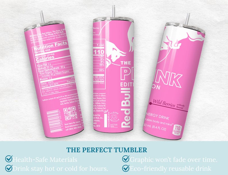 May include: Three pink Red Bull tumblers with white text and a silver straw. The tumblers feature the text "The Pink Edition" and "Wild Berries". The tumblers have nutrition facts and the Red Bull logo.