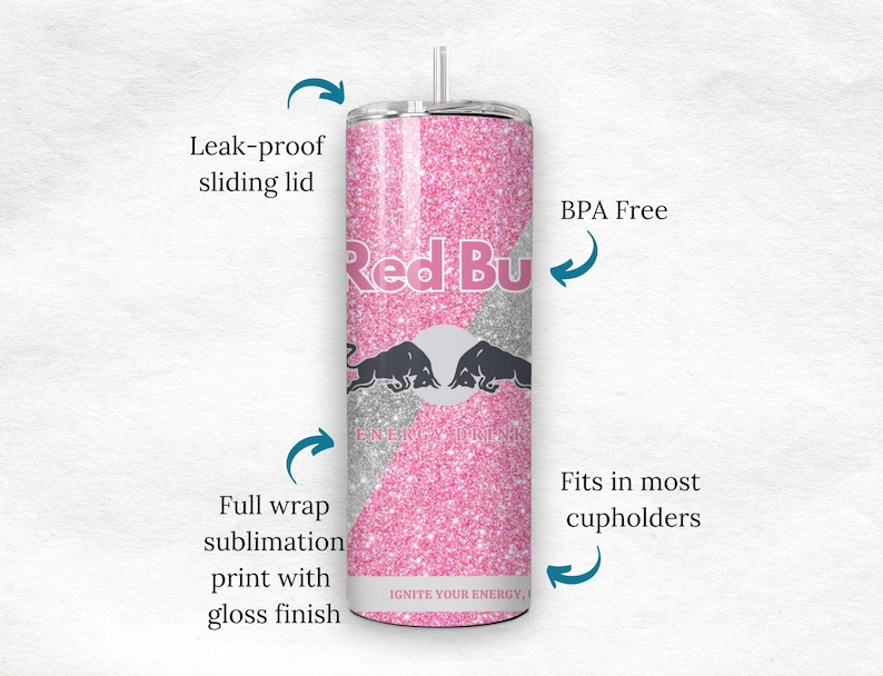 May include: A pink glitter tumbler with the Red Bull logo. The tumbler has a leak-proof sliding lid and is BPA-free. The design includes a full wrap sublimation print with a gloss finish. The text "IGNITE YOUR ENERGY" is visible.