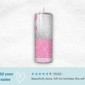 May include: A stainless steel tumbler with a silver glitter top half and a pink glitter bottom half. The name "EMMA" is printed vertically in pink. The text "UNLEASH YOUR SLAY" is printed at the bottom.