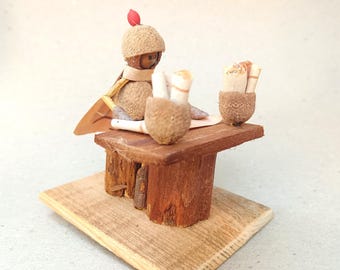 Acorn elf is so busy working with all these papers and facing deadlines..