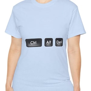 May include: A light blue t-shirt with the words "Ctrl", "Alt", and "Del" printed on it in black.