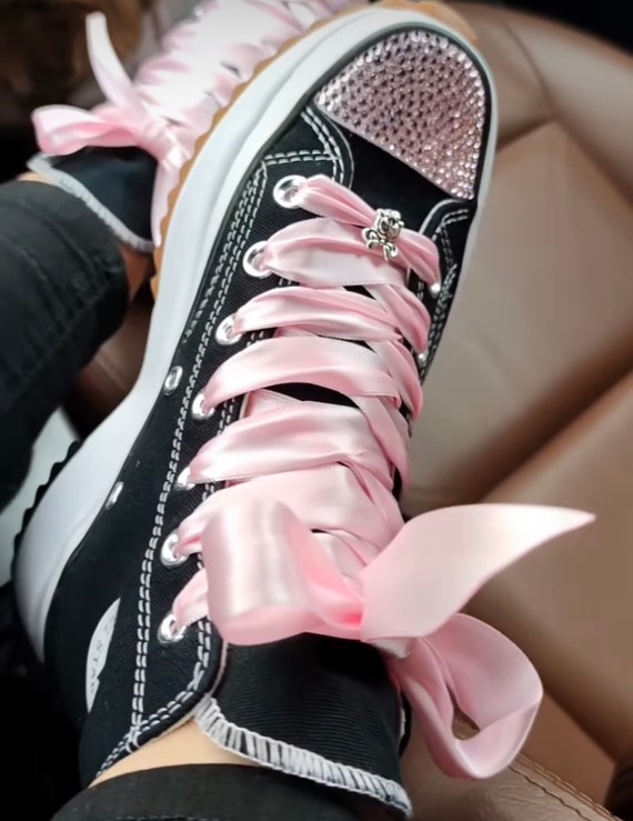 black converse with pink laces