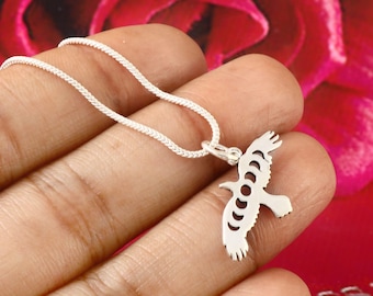 sterling silver raven charm with moon phases