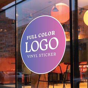 May include: A round, full-color vinyl sticker with a white outline. The sticker has a purple to pink gradient background and white text that reads "FULL COLOR LOGO VINYL STICKER".