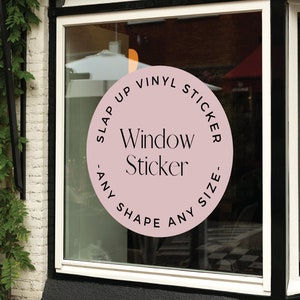 May include: A pink circle window sticker with the text "Slap Up Vinyl Sticker - Any Shape Any Size - Window Sticker" in black.