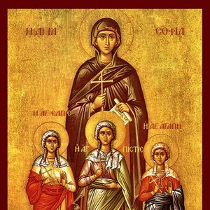 May include: An icon depicting Saint Sophia and her three daughters, Faith, Hope, and Love. The icon is painted in a traditional Byzantine style with gold backgrounds and halos around the figures. The figures are depicted in colorful robes and holding crosses.