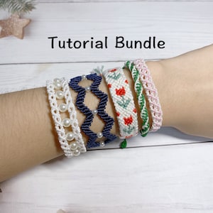 May include: A set of five friendship bracelets, including a white bracelet with pearl beads, a navy blue bracelet with a geometric pattern, a white bracelet with a floral pattern, a green bracelet with a braided design, and a pink bracelet with a braided design. The bracelets are worn on a person's wrist. Tutorial Bundle.