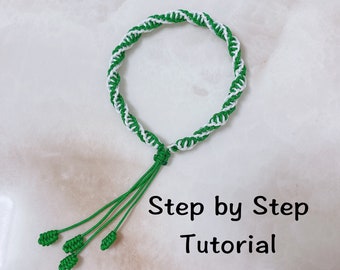 May include: A green and white braided bracelet with a knotted tassel. Step by Step Tutorial.