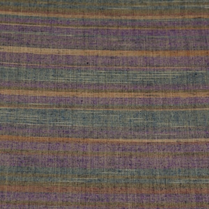 May include: A close-up of a woven fabric with horizontal stripes in shades of brown, purple, and blue.
