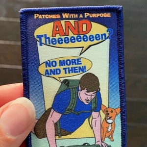May include: A blue and yellow embroidered patch with a cartoon illustration of a person with a backpack and a dog. The text on the patch reads "Patches With A Purpose" and "AND Theeeeeeen? NO MORE AND THEN!"