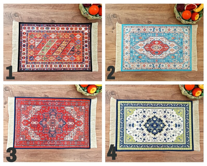 May include: Four different patterned rugs with fringe edges. The rugs are red, blue, green, and white with intricate designs.
