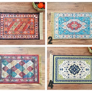 May include: Four different patterned rugs with fringed edges. The rugs are in various colours, including red, blue, green, and white. The rugs are all rectangular and have a similar design.