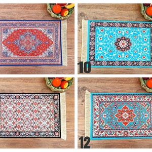 May include: Four different patterned rugs with fringe edges. The rugs are red and blue, blue and white, white and red, and blue and orange. The rugs are all approximately 10 inches by 14 inches.
