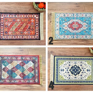 May include: Four different patterned rugs with fringed edges. The rugs are in various colours, including red, blue, green, and white. The rugs are all rectangular and have a similar design.
