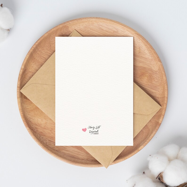May include: A blank white card with a pink heart and the text "Happy Elf Digital" in black script.