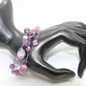 Czech Glass Bracelet in Orbit lobster claw closure. Pink design. 8&quot; inches long many colors 002