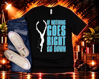 May include: A black t-shirt featuring a white silhouette of a freediver and the light blue text "IF NOTHING GOES RIGHT GO DOWN" alongside a pair of blue denim jeans and off-white canvas sneakers with white laces and rubber soles.