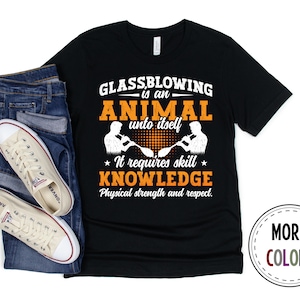 May include: Black t-shirt with white text that reads "Glassblowing is an animal unto itself. It requires skill, knowledge, physical strength and respect."